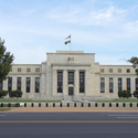 400 Ph.D. Economists vs. One Shiny Rock